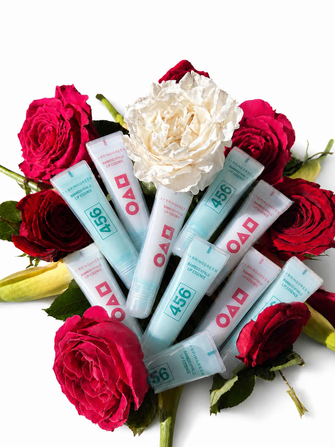 Bring Green x Squid Game Bamboo Hyalu Lip Essence #5 - lifestyle with roses