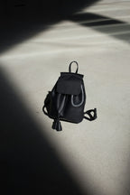 Black leather mini backpack with drawstring