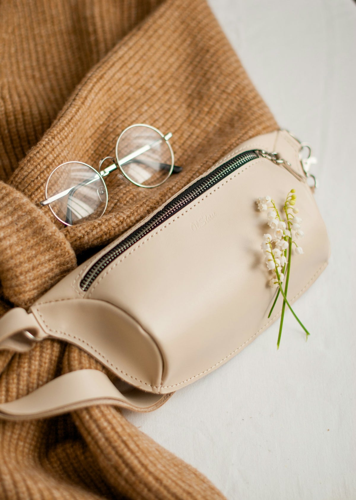 Cream leather mini bag flat lay