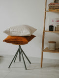 Linen cushion covers in natural and rust