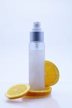 Frosted body mist spray bottle with citrus