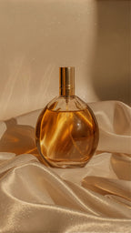 Amber eau de parfum bottle on satin