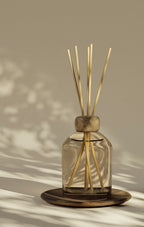 Reed diffuser in glass bottle