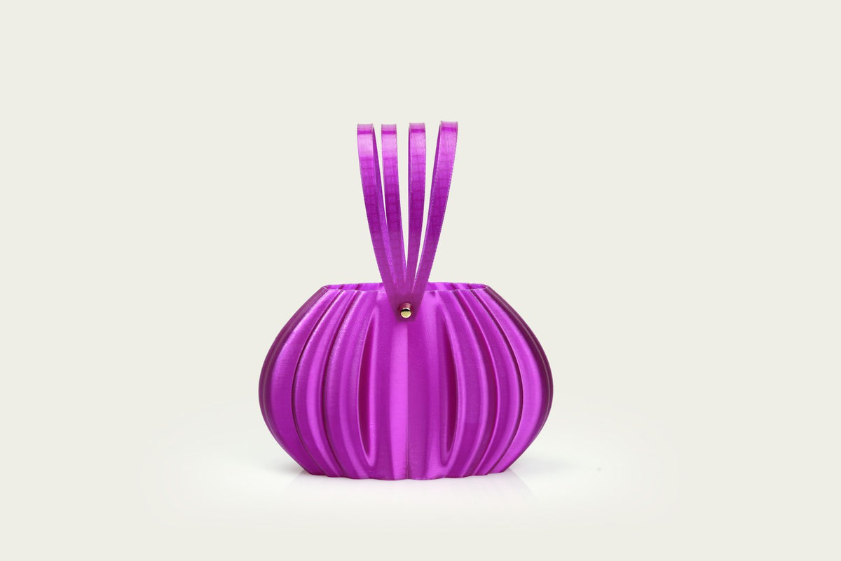 Pleated evening clutch in ivory