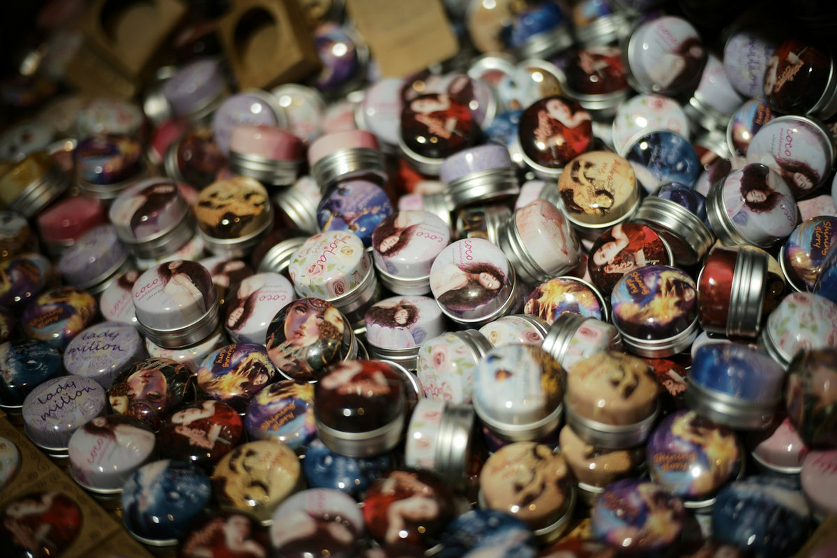 Decorative solid perfume tins
